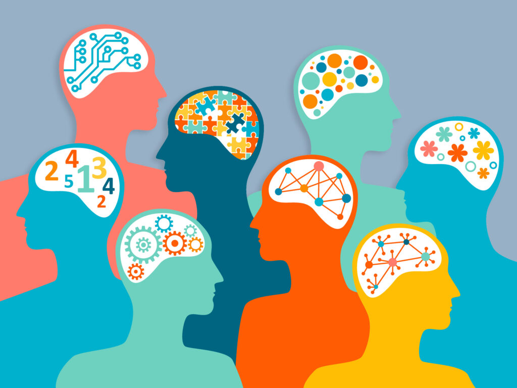 illustrations of many silhouetted heads with diverse types of brains